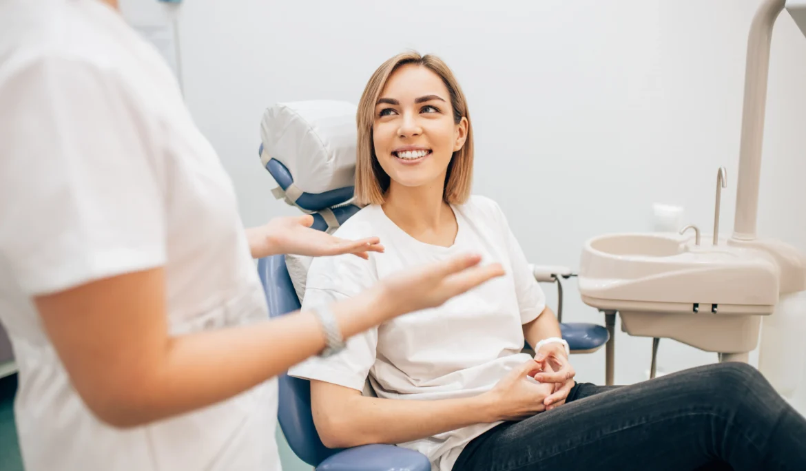 young beautiful lady with blond short hair sit in dentist office, waiting for a teeth treatment. Medicine, dentist concept